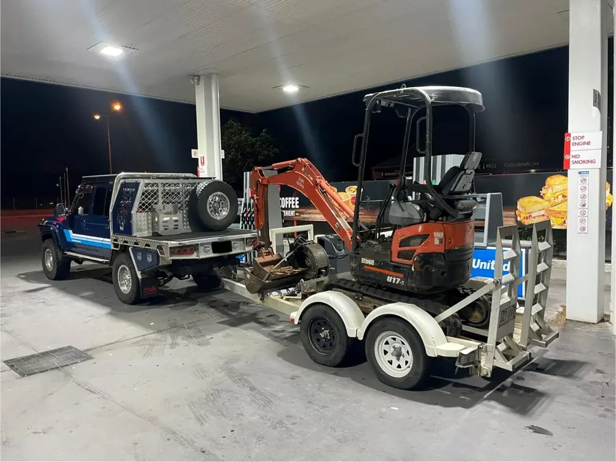 Digger2Hire Kubota U17-3 mini excavator loaded on trailer for transport