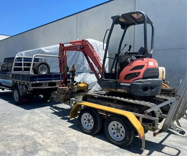 Digger2Hire Kubota U25-3 2.5T excavator on its trailer